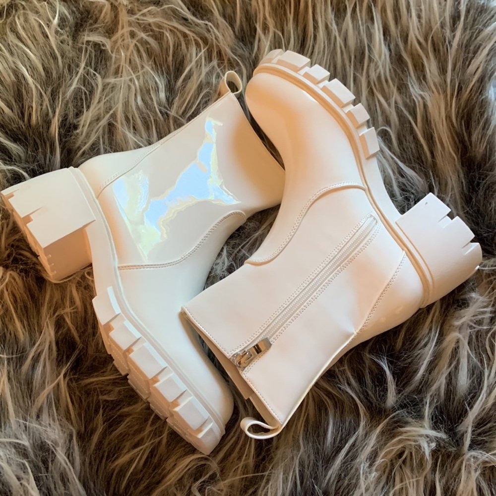 Brand New.  All white patent pleather boots